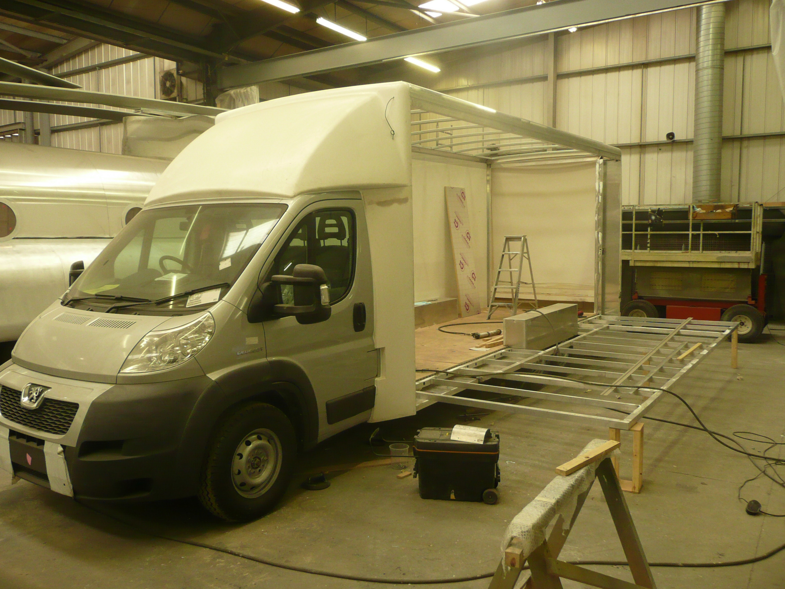 Children in Crisis mobile classroom being built