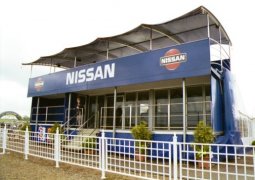 Nissan Touring car hospitality and grandstand trailer side view deployed