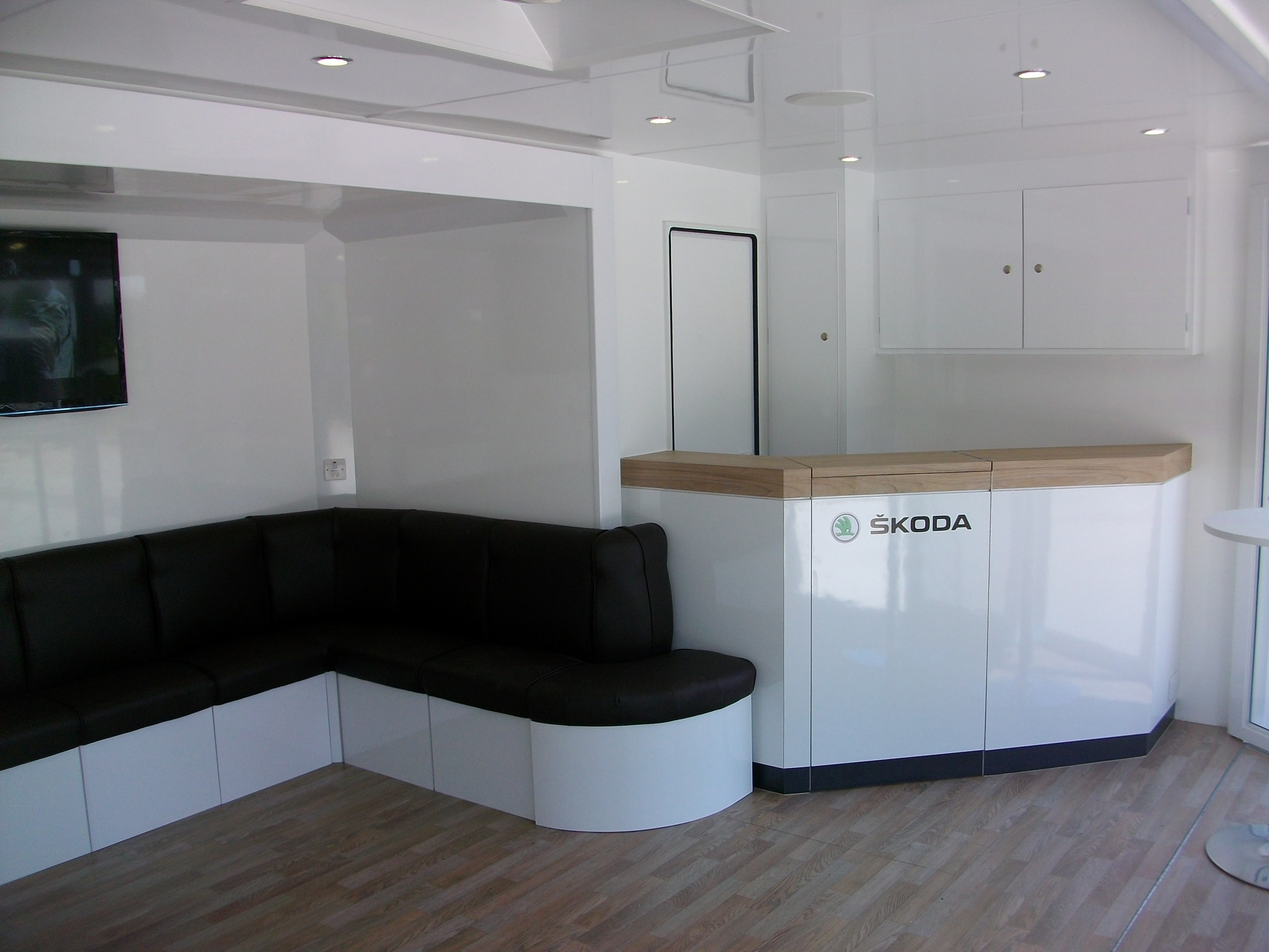 Skoda Exhibition and Hospitality trailer internal view of modular furniture and recetion galley